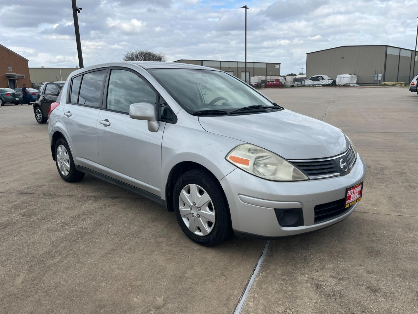 2009 SILVER /black Nissan Versa 1.8 S Hatchback (3N1BC13E09L) with an 1.8L L4 DOHC 16V engine, Manual transmission, located at 14700 Tomball Parkway 249, Houston, TX, 77086, (281) 444-2200, 29.928619, -95.504074 - Photo #0
